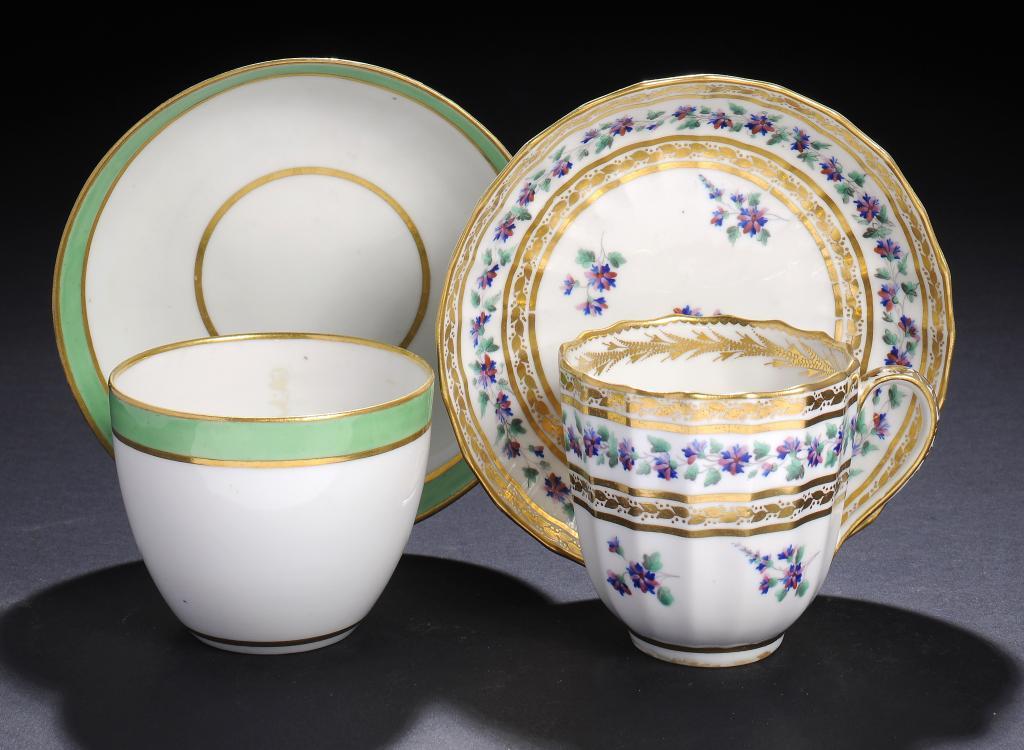 A DERBY HANDLELESS TEACUP AND SAUCER AND A FLUTED COFFEE CUP AND SAUCER, C1795-1800  the latter