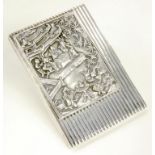 A CONTINENTAL SILVER REED CIGARETTE CASE THE LID APPLIED WITH AN EARLIER CHINESE SILVER REPOUSSE