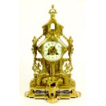 A FRENCH 19TH CENTURY BRASS ARCHITECTURAL STYLE MANTLE CLOCK, FORMERLY GILT, LACQUERED, 44CM H