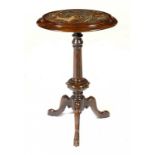 A VICTORIAN WALNUT TRIPOD TABLE, c1860 with oval septarian nodule inset top, 75cm h; 39 x 52cm ++The