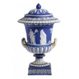 A WEDGWOOD BLUE JASPER DIP VASE AND COVER, C1860 sprigged with muses, 31cm h, impressed mark ++A