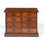 A VICTORIAN WALNUT COLLECTORS CABINET, C1870 fitted with eight drawers each with rosewood knob, 38cm