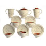 A SUSIE COOPER EARTHENWARE TEA SERVICE, C1939 of Falcon shape, transfer printed with stars in