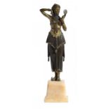 DEMETRE CHIPARUS. AN ART DECO GILT AND PATINATED BRONZE FIGURE OF WOMAN WITH MIRROR, C1925 on onyx