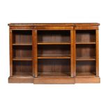 A VICTORIAN WALNUT BREAKFRONT OPEN BOOKCASE, C1870 with adjustable shelves, 118cm h; 32 x 183cm ++In