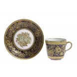 A SAMPSON HANCOCK CABINET CUP AND SAUCER, C1890 with raised gilt decoration by John Winfield on a