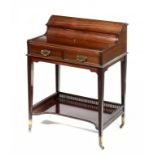A VICTORIAN MAHOGANY WRITING TABLE, C1900 with lidded stationery compartment and leather inlet