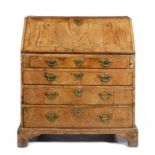 A GEORGE II WALNUT BUREAU, C1750 with straight fitted interior, the sides of pine, 100cm h; 48 x