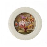 A ROCKINGHAM PLATE, C1826-30 of anthemion and gadrooned moulded shape, painted probably by John