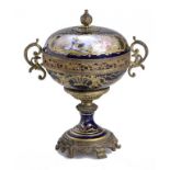 A FRENCH GILTMETAL MOUNTED SÈVRES STYLE FOOTED BOWL AND COVER, C1900 painted with lovers and