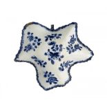 A BOW BLUE AND WHITE PICKLE LEAF DISH, C1765-70 painted with flower sprays, 9cm l ++Chip on rim to