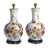 A PAIR OF EARTHENWARE PSEUDO TOBACCO LEAF PATTERN BOTTLE VASES, PROBABLY 19TH C adapted as lamps