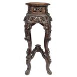 A CHINESE CARVED ROSEWOOD STAND, LATE 19TH C with octagonal marble inset top, 91cm h ++A good
