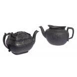 A DON BLACK BASALT COMMEMORATIVE TEAPOT, C1810 engine turned and moulded to either side with a shell