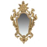 A VENETIAN GILTWOOD MIRROR, 19TH C the arched and tapered frame crested by a shell flanked by