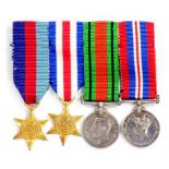 A GROUP OF FOUR WORLD WAR II MINIATURE MEDALS, MOUNTED, IN SPINK & SON LTD BOX