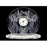 A LALIQUE GLASS IRIS MANTLE CLOCK, 17CM H, OF RECENT MANUFACTURE