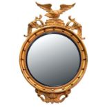 A REGENCY STYLE GILT CONVEX MIRROR, 80CM H