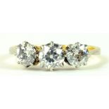 A DIAMOND THREE STONE RING IN GOLD, MARKED 18CT PLAT, 2.9G GROSS