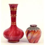 A CONTINENTAL RUBY MARBLED GLASS VASE, BOTTLE SHAPED WITH RAISED GILT DECORATION, 31.5CM H AND A