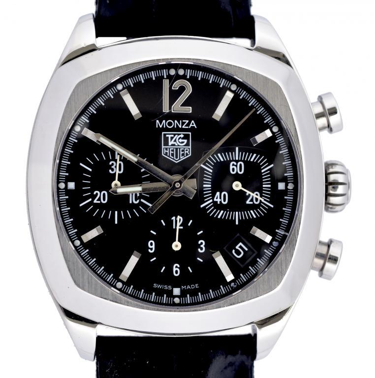 A TAG HEUER STAINLESS STEEL SELF WINDING MONZA WRISTWATCH, THE BLACK DIAL WITH THREE SUBSIDIARY