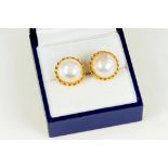 A PAIR OF CULTURED PEARL AND GOLD EAR STUDS, MARKED K18, 4.1G GROSS