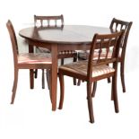 A REPRODUCTION MAHOGANY DINING SUITE