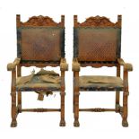 A PAIR OF SPANISH BAROQUE STYLE CARVED WALNUT ARMCHAIRS, 117CM H