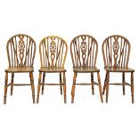 A SET OF FOUR ASH WHEELBACK WINDSOR CHAIRS WITH ELM SEAT