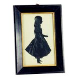 A VICTORIAN PAINTED AND CUT PAPER FULL LENGTH SILHOUETTE OF A GIRL, EBONISED FRAME, 15.5CM X 21.5CM