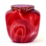 A RUBY MARBLED GLASS VASE OF DIMPLED SQUARE FORM WITH ENAMELLED AND GILT RIM, 21CM H, EARLY 20TH