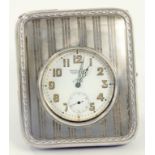 A GEORGE V SILVER MOUNTED AND ALLIGATOR HIDE COVERED CLOCKCASE, 11CM H, LONDON 1922, CONTAINING A