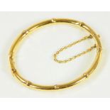 A GOLD BAMBOO FORM BRACELET, INDISTINCTLY MARKED AND STRUCK '20', 14G