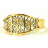 A DIAMOND OPENWORK RING IN GOLD, 3.8G GROSS