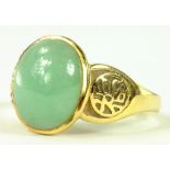 A JADE CABOCHON RING IN 14CT GOLD, IMPORT MARKED, 3.6G GROSS