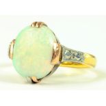 A 22CT GOLD WEDDING RING, ADAPTED AND SET WITH AN OPAL, 5G GROSS