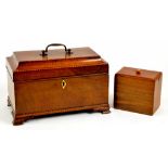 A GEORGE III MAHOGANY TEA CADDY WITH BARBER POLE STRINGING, THE INTERIOR WITH LATER CANISTERS ON