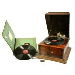 AN ACADEMY TABLE GRAMOPHONE IN STAINED WOOD CASE, 30CM H AND A QUANTITY OF 78 RPM RECORDS