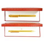 A LE MUST DE CARTIER GOLD PLATED FOUNTAIN PEN, THE GOLD NIB MARKED 750 18K AND A LE MUST DE