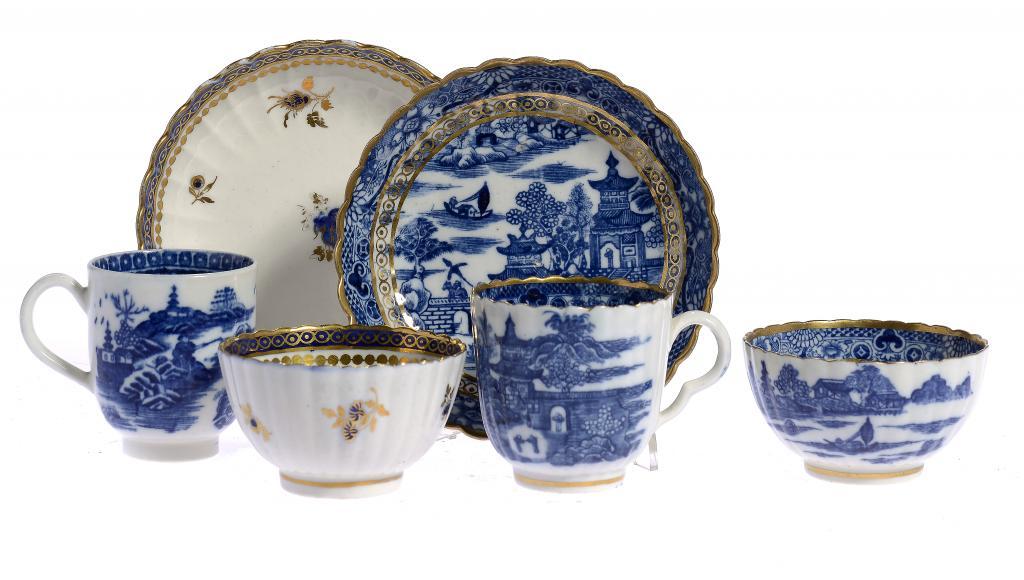 A CAUGHLEY BLUE AND WHITE TRIO, COFFEE CUP AND BLUE AND GILT TEA BOWL AND SAUCER, C1780-99 the
