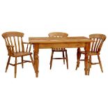 A WAXED PINE KITCHEN TABLE,. 136CM W AND THREE ASH KITCHEN CHAIRS