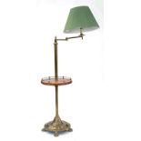 AN EARLY 20TH CENTURY BRASS ADJUSTABLE READING LAMP WITH WALNUT SHELF, 110CM H
