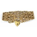 A 9CT GOLD BRACELET AND PADLOCK, 32.6G