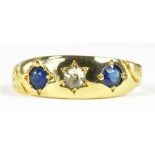 A SAPPHIRE AND DIAMOND THREE STONE GYPSY SET RING, IN 18CT GOLD, CIRCA 1900, 3.7G GROSS