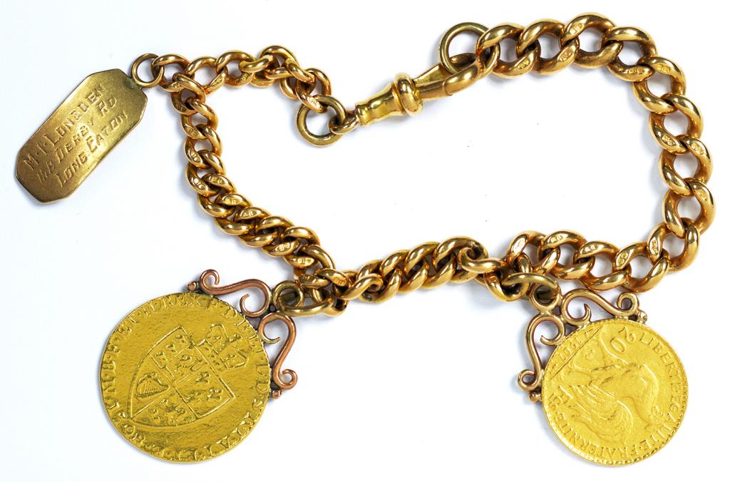 AN 18CT GOLD BRACELET, ADAPTED FROM AN ALBERT, MOUNTED WITH TWO GOLD COINS, COMPRISING GUINEA 1798
