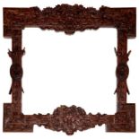 A CHINESE CARVED WOOD FRAME, CRISPLY CARVED WITH AUSPICIOUS EMBLEMS, INCLUDING DRAGONS, PHOENIX,