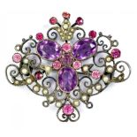 AN EARLY 20TH CENTURY PINK PASTE, SPLIT PEARL AND SILVER OPENWORK BROOCH