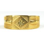 A 9CT GOLD RING, GYPSY SET WITH A SMALL DIAMOND, 4.6G GROSS