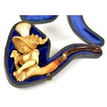 A MEERSCHAUM FIGURAL CHEROOT HOLDER, CARVED WITH THE HEAD AND TORSO OF A FASHIONABLE YOUNG WOMAN,