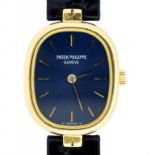 A PATEK PHILIPPE 18CT GOLD ELIPSE WRISTWATCH, WITH BLUE DIAL, PATEK PHILIPPE BLACK LEATHER STRAP AND